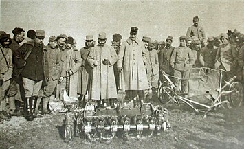 "Commandant Brocard chief of Guynemer in front of the aircraft shot down" (Guynemer's 26th air victory—23 January 1917. The 27th victory from Flieger-Abteilung (A) 216 burned [Crew killed][citation needed]