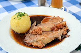 Roast pork with Kartoffelknödel, a Bavarian potato dumpling