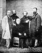 Fernando Garrido, Élie Reclus, José María Orense (sentado), Aristide Rey y Giuseppe Fanelli, fotografía de 1869.