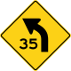 Zeichen W1-2aL Linkskurve mit empfohlener Geschwindigkeit