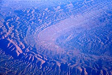 aerial view of curved mountain range