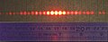 波长为633纳米的激光通过一个具有150条狭缝的网格