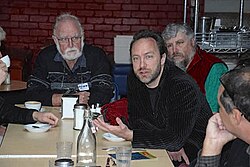 Photo taken at the Wikipedia 2007 meetup in Melbourne with Jimbo, with me on the left.