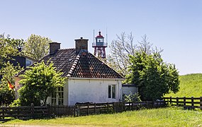 Stavoren House on the Noorderweg with the red lighthouse in the background.