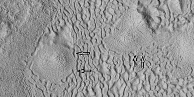 Brain terrain being formed, as seen by HiRISE under HiWish program. Note: this is an enlargement of a previous image using HiView. Arrows indicate spots where brain terrain is beginning to form.