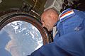 Andre Kuipers looks through the Earth observation window