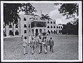 Gambar mini seharga Gambar:Members of the Executive Committee of The Barbados Government crossing the lawn in front of Government House, Barbados, March 1955, TNA INF 10-48-7.jpg