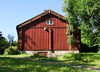 Kavlåsstugan bakom museet.