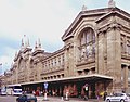 Paris-Nord (1861): wielka kompozycja w stylu klasycyzującego baroku, akcentująca na osi główną halę peronową