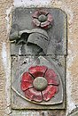 Canting arms of the House of Rosenberg as they appear on the gate of Vyšší Brod Monastery