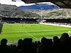 Vue sur un terrain de football depuis les tribunes