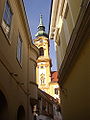 Spire of the main church of Stockerau, as seen from a lane in the centre of town