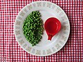 Half a cup of cooked vegetables, e.g. cooked peas