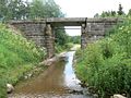 Railway bridge over Pulga stream and a road at the same time