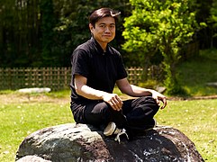 Sitting on my meditation rock.jpg