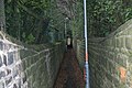 A narrow, bricked ginnel in Leeds