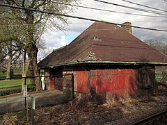 Woodland station building from passing train, April 2013.JPG