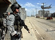 Army Rangers from the 1st Ranger Battalion, conduct a MOUT exercise at Fort Liberty, North Carolina, 21 April 2009