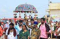 People participating in the fair with the famous umbrella of Tarnetar
