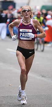 A photo of Paula Radcliffe running on a New York street