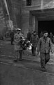 U-96 Crew disembarking after arrival. St. Nazaire's U-boat pens are in the background.