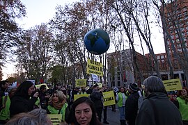 Globe with sign (photo) "No Hay Planeta B" (There is no planet B), Climate March near Climate Conference COP25, 2019