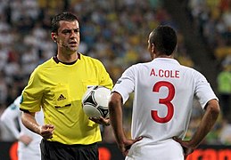 Viktor Kassai and Ashley Cole (ENG - UKR).JPG