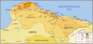 Topographic map of north east Libya (Cyrenaica) and north west Egypt. To the south lies the Great Sand Sea and the Qattara Depression; to the north, the Mediterranean Sea. The area in between is dominated by the high ground close the coast. The highest is the Jebel Akhdar in northern Cyrenaica between Benghazi in the east and Derna in the north, about 150 km away. Tobruk lies about another 150 km further east. Bardia lies another 110 km further east still, still in Cyrenaica but close to the border with Egypt. All are coastal towns. Roads and railways generally follow the coast, and there are only tracks in the interior.