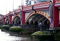 Image 38Vauxhall Bridge across the River Thames opened in 1906 and features sculptures by F. W. Pomeroy.