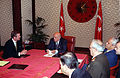 The Turkish flag and the Presidential Standard behind the 9th President Süleyman Demirel.