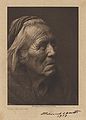 Signed photogravure by Edward S. Curtis of a Navaho medicine-man.