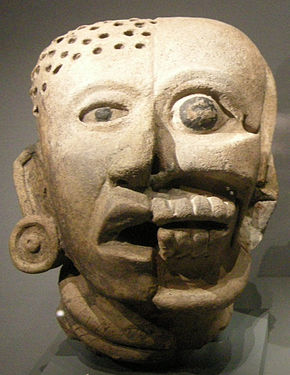 Head depicting a fleshy face on one side, and a skull on the other, 300-600 CE