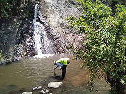 Water sampling in Kikuube District