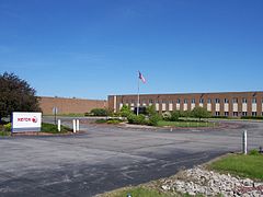 Bekas pabrik di Henrietta, New York, dibangun pada dekade 1960-an dan dijual ke Harris RF Communications pada tahun 2010