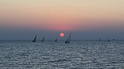 Thumbnail for File:Sunset with keelboats, Warnemünde.jpg