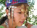 A Uzbek girl with traditional headdress. (Uzbekistan)