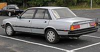 1987 Peugeot 505 Turbo S, showing North America-specific taillights and exhaust on the left (USA)