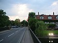 View from the main Sonning Backwater Bridge along the B478 road in Sonning Eye with the French Horn hotel on the right