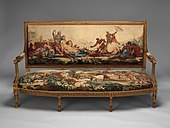 Louis XVI settee; designed in circa 1786, woven 1790–91, settee frame from the second half 19th century; carved and gilded wood, with wool and silk; 107.3 × 191.5 × 71.1 cm; Metropolitan Museum of Art