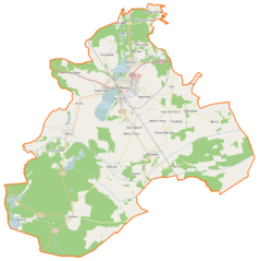 Mapa konturowa gminy Wolsztyn, blisko centrum u góry znajduje się punkt z opisem „Parowozownia Wolsztyn”