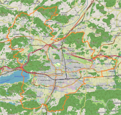 Mapa konturowa Klagenfurtu am Wörthersee, blisko centrum na lewo znajduje się punkt z opisem „Zamek Mageregg”