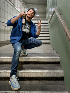 Young fellow posing with beer bottle, Kottbusser Tor