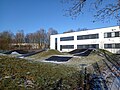 Lohneum (hinten links), Tanzhalle des Vereins Stage 7 (Mitte rechts) und Skaterbahn (vorne links)