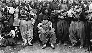 Bayz ‘Agha,’ chief of the “Mangur” Kurdish Tribe, and his Mangur Men.jpg