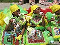 Young "Mardi Gras Indians" eating cotton candy, New Orleans