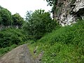 Road in Karinj with small cliffs