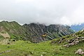 a view to mountains in clouds,