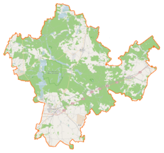 Mapa konturowa powiatu chojnickiego, blisko centrum na lewo u góry znajduje się punkt z opisem „Asmus”