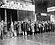 Unemployed_men_queued_outside_a_depression_soup_kitchen_opened_in_Chicago_by_Al_Capone,_02-1931_-_NARA_-_541927