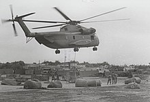 Black and white photograph of a helicopter